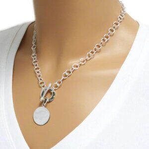 CHIC STERLING SILVER PERSONALIZED ROUND TAG PENDANT WITH NECKLACE OPTIONS.